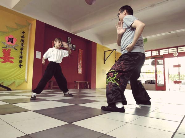 Sifu Raymond Teaching a Student